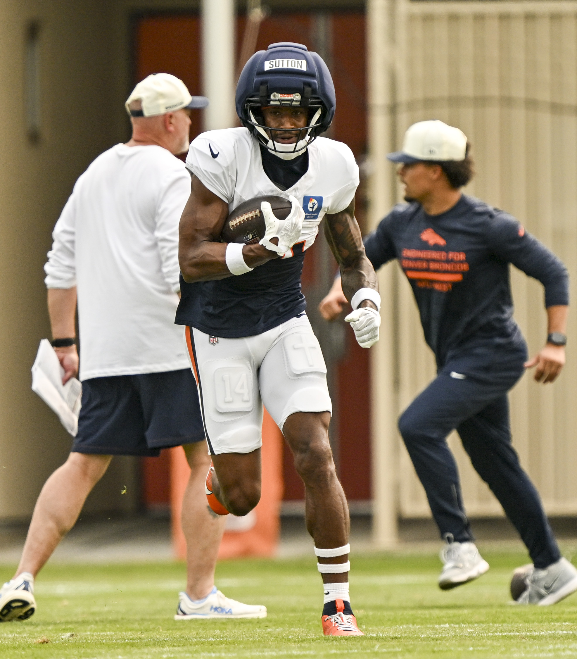 CENTENNIAL , CO - AUGUST 3: Courtland Sutton (14) of the Denver Broncos runs after making a catch during training camp at Broncos Park in Centennial, Colorado on Monday, August 3, 2026. (Photo by AAron Ontiveroz/The Denver Post)