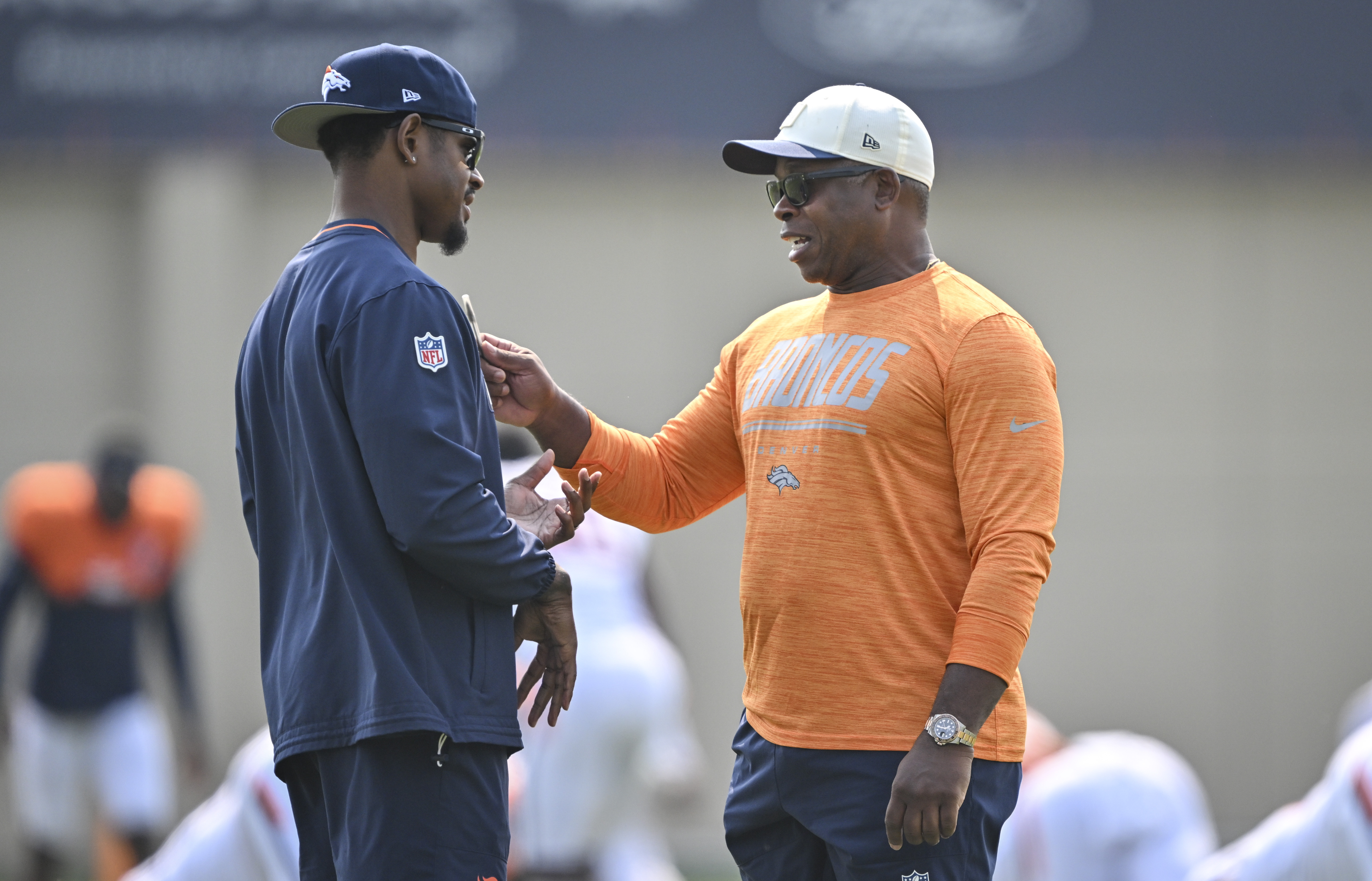 Defensive coordinator Vance Joseph of the Denver Broncos talks to Todd Davis during training camp at Broncos Park in Centennial on Tuesday, Aug. 4, 2026. (Photo by AAron Ontiveroz/The Denver Post)