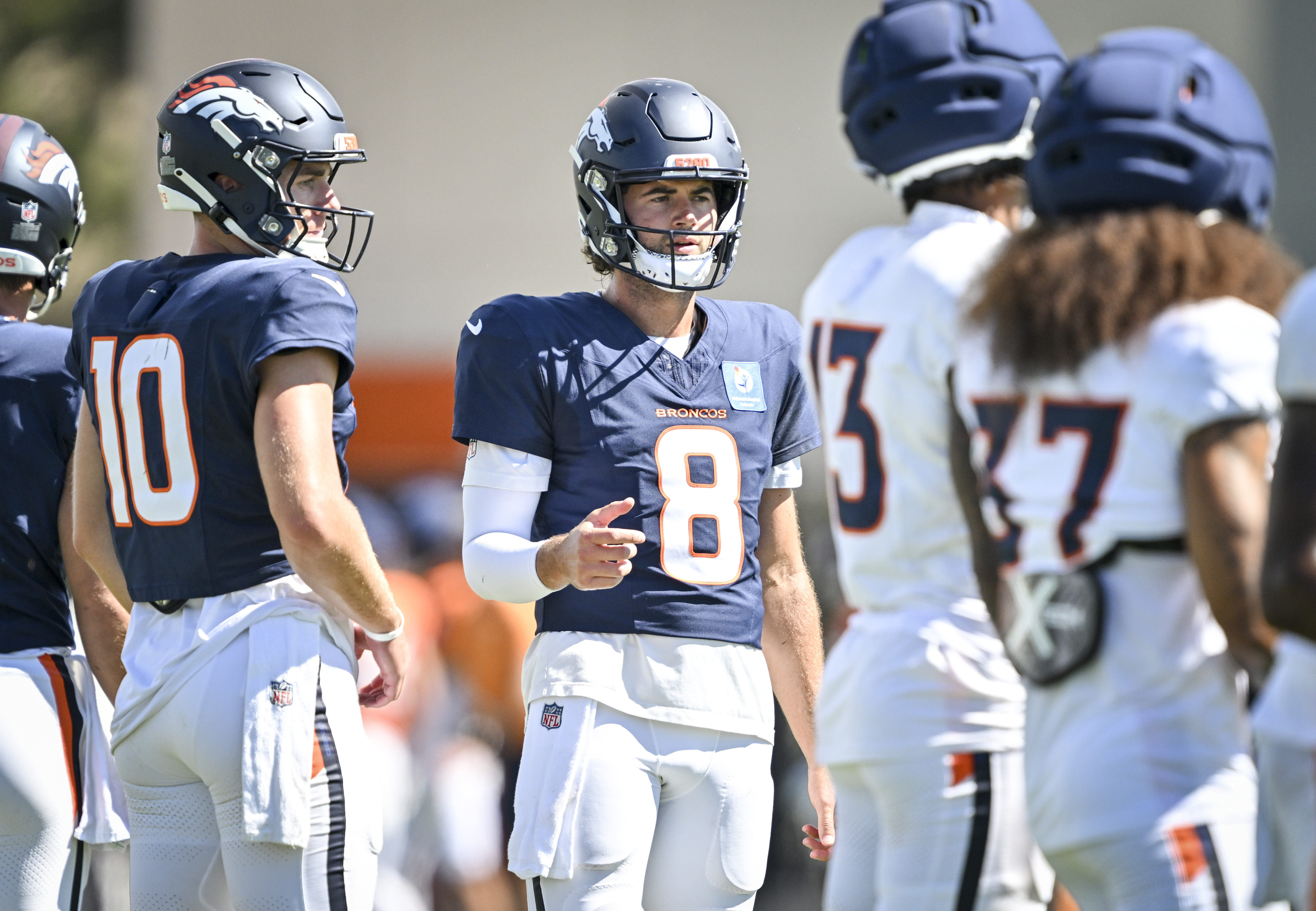 Bo Nix (10) and Jarrett Stidham (8) of the Denver Broncos work with receivers during training camp at Broncos Park in Centennial, Colorado on Wednesday, August 19, 2026. (Photo by AAron Ontiveroz/The Denver Post)