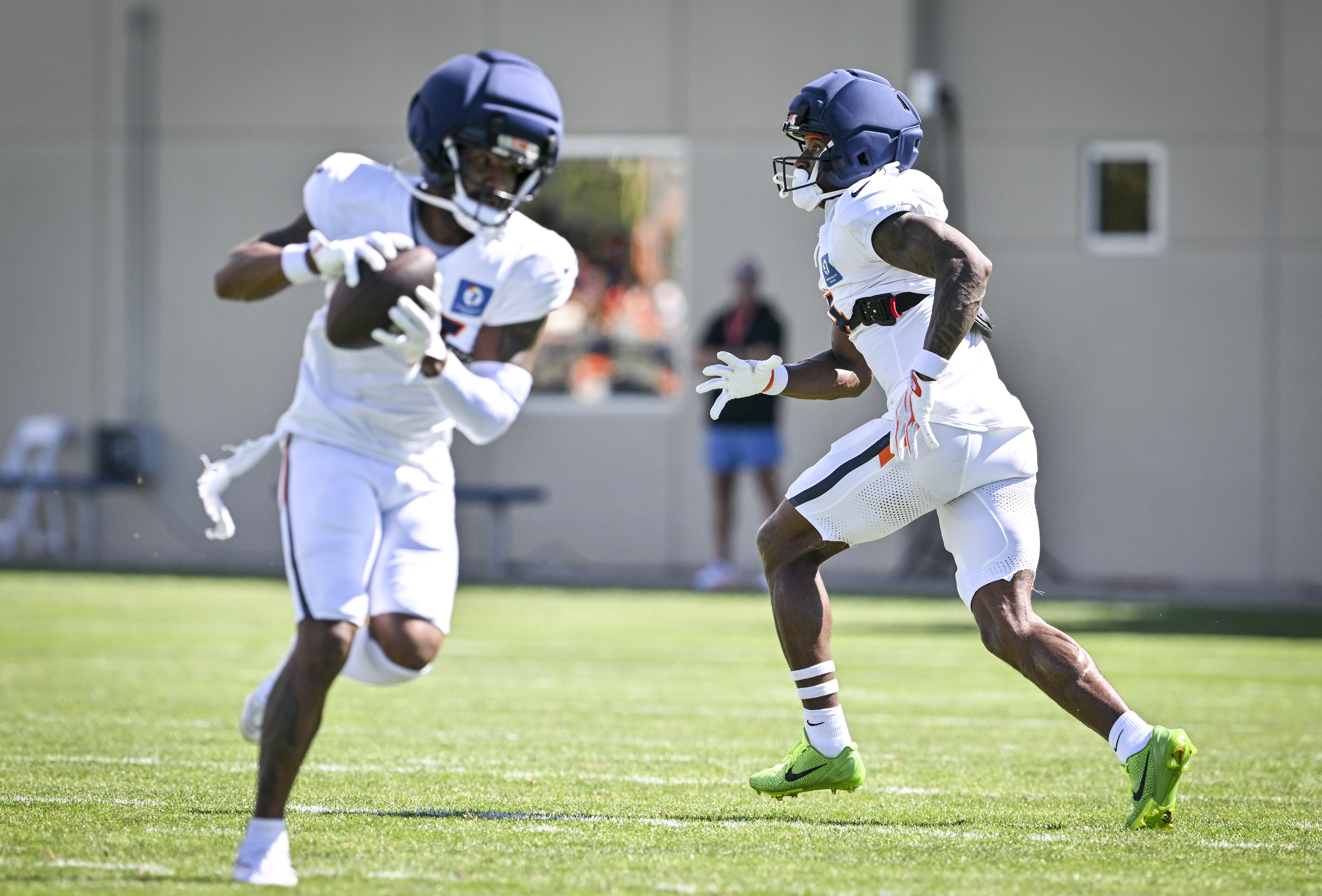 Jaylen Waddle (17) and Courtland Sutton (14) of the Denver Broncos run routes during training camp at Broncos Park in Centennial, Colorado on Wednesday, August 19, 2026. (Photo by AAron Ontiveroz/The Denver Post)