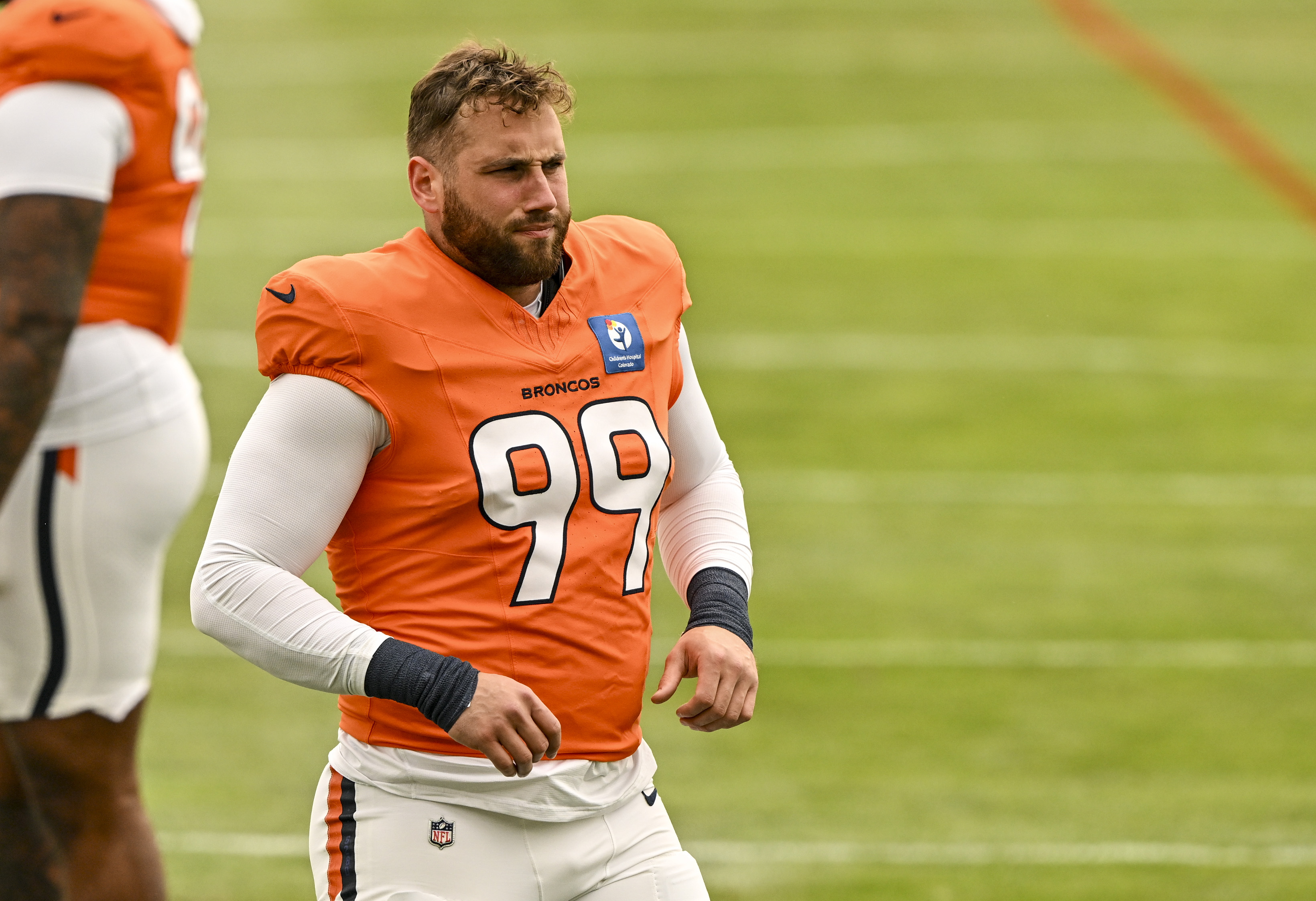 Zach Allen (99) of the Denver Broncos stands on the field during training camp at Broncos Park in Centennial, Colorado on Monday, Aug. 3, 2026. (Photo by AAron Ontiveroz/The Denver Post)