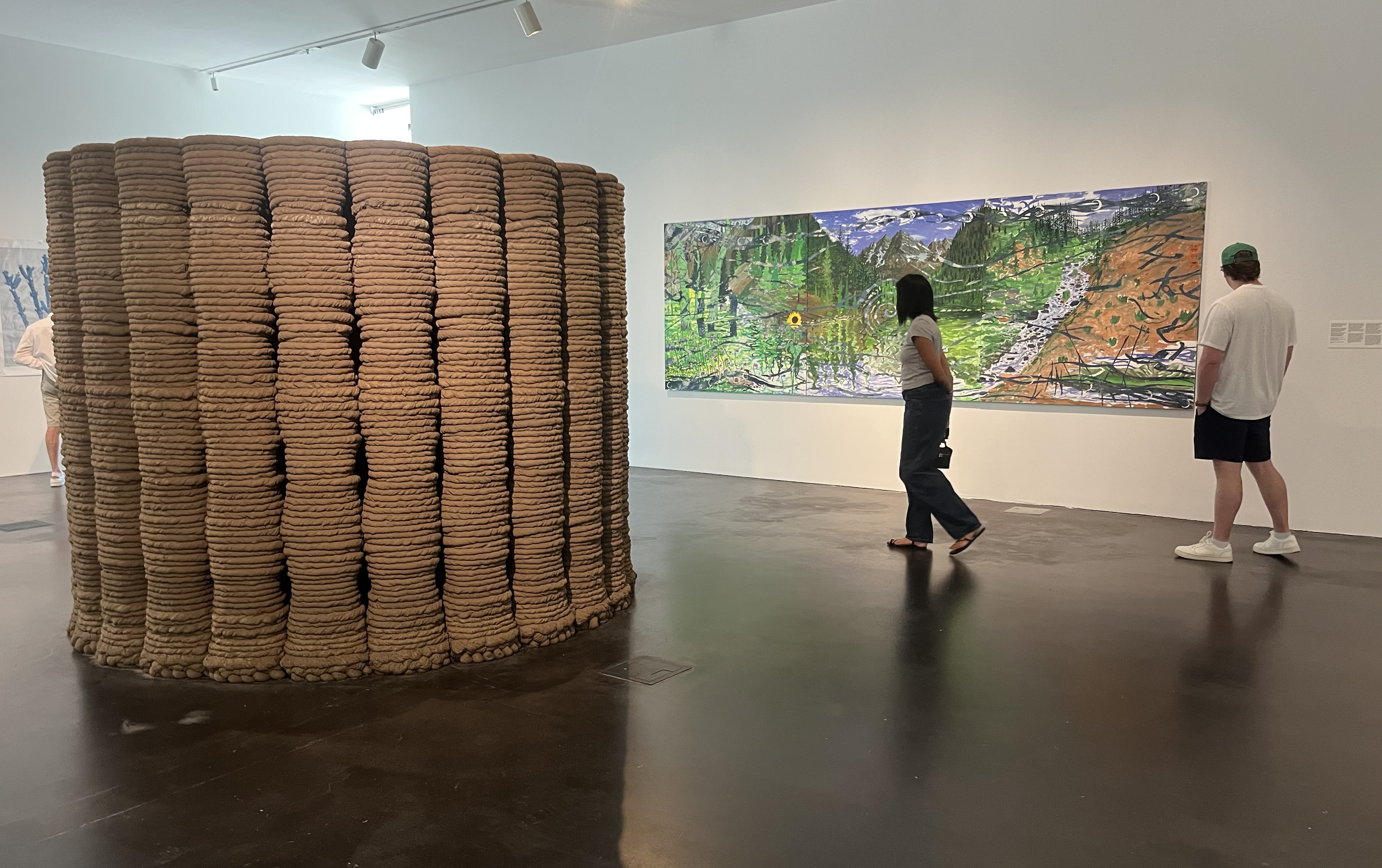 Ronald Rael's 3D-printed adobe sculpture stands in front of Esteban Cabeza de Baca's painting that was inspired by the landscape around Aspen, Colorado. (Ray Mark Rinaldi, Special to The Denver Post)