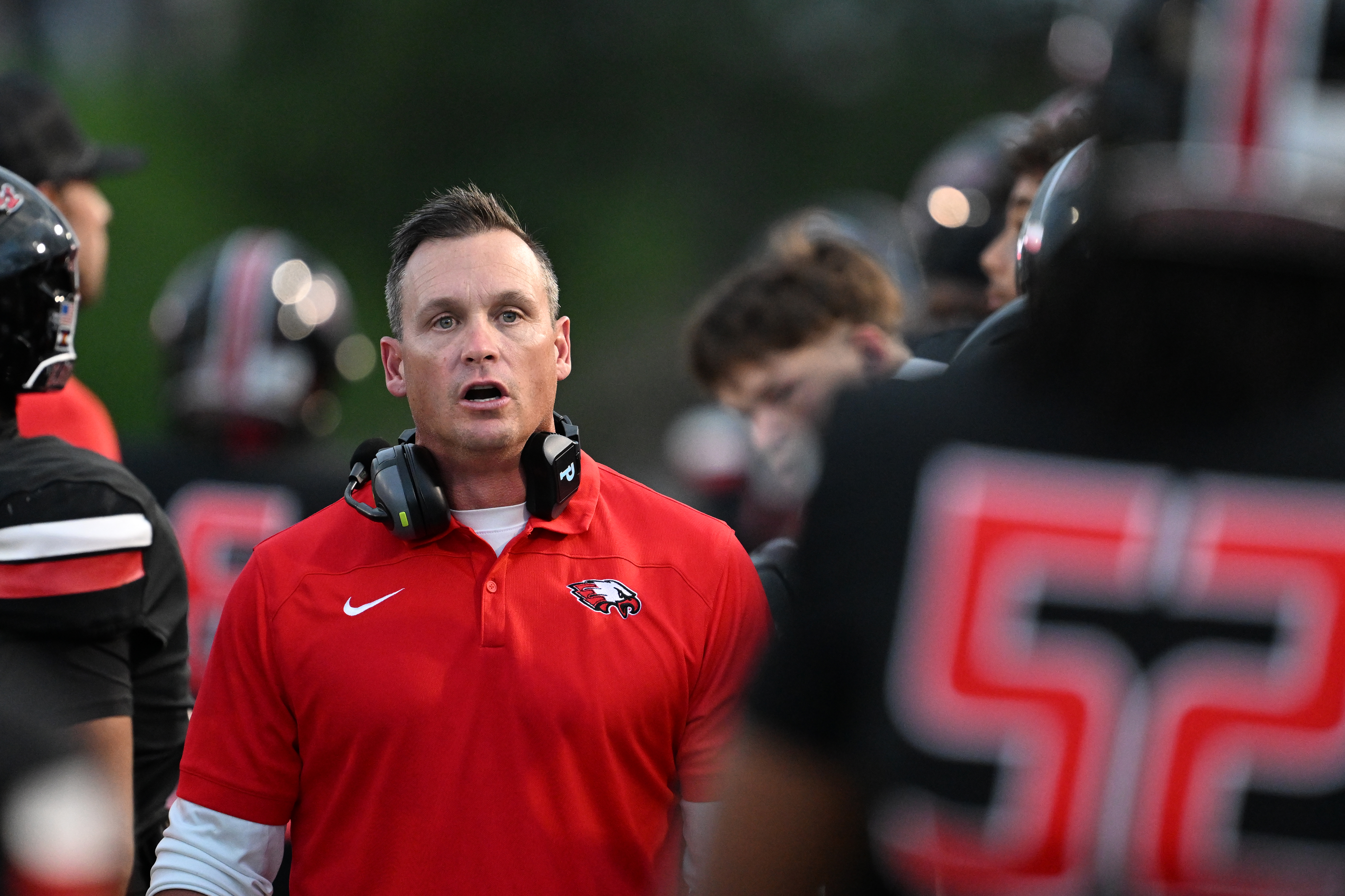 AURORA, CO - SEPTEMBER 17: Eaglecrest head coach Jesse German talks with his players as they take on Cherokee Trail at Legacy Stadium on Thursday, September 17, 2026, in Aurora, Colorado. (Photo by RJ Sangosti/The Denver Post)