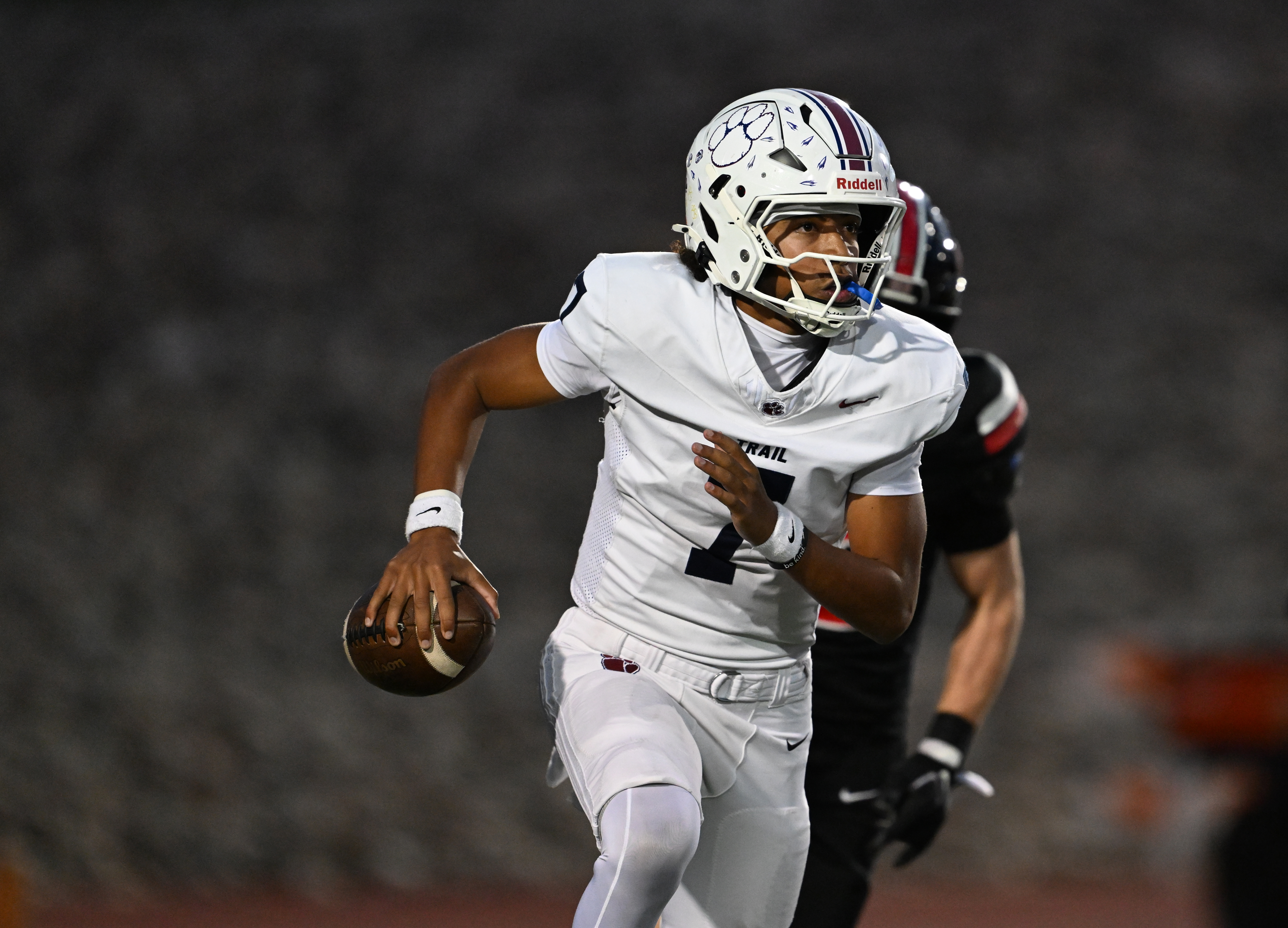 Cherokee Trail's Bryson Peterson (7) looks downfield for somewhere to throw against Eaglecrest at Legacy Stadium on Thursday, September 17, 2026, in Aurora, Colorado. (Photo by RJ Sangosti/The Denver Post)