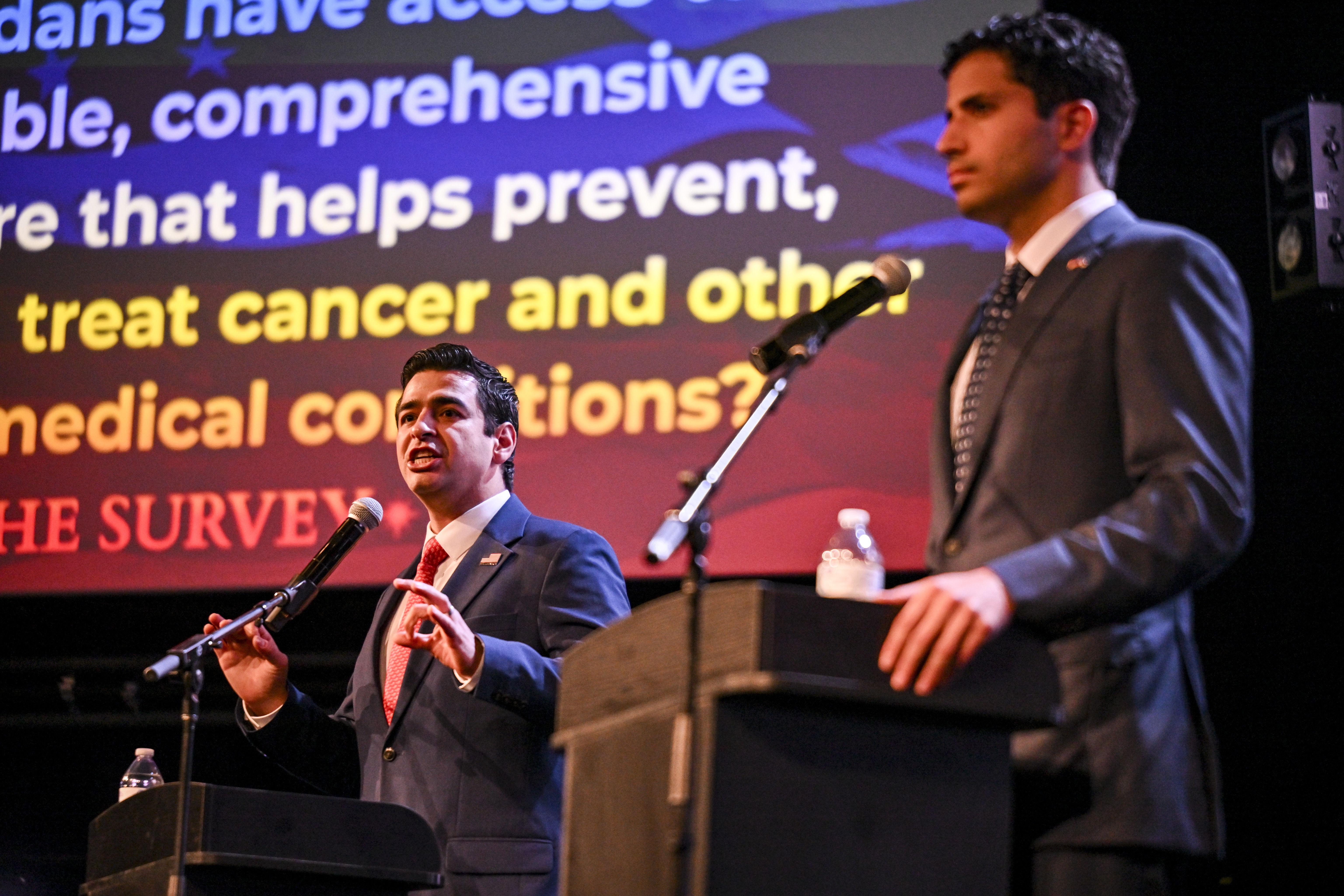 Congressman Gabe Evans speaks as Democratic challenger Manny Rutinel listens during an 8th Congressional District debate at Grace Place in Berthoud on Wednesday, Oct. 7, 2026. (Photo by AAron Ontiveroz/The Denver Post)