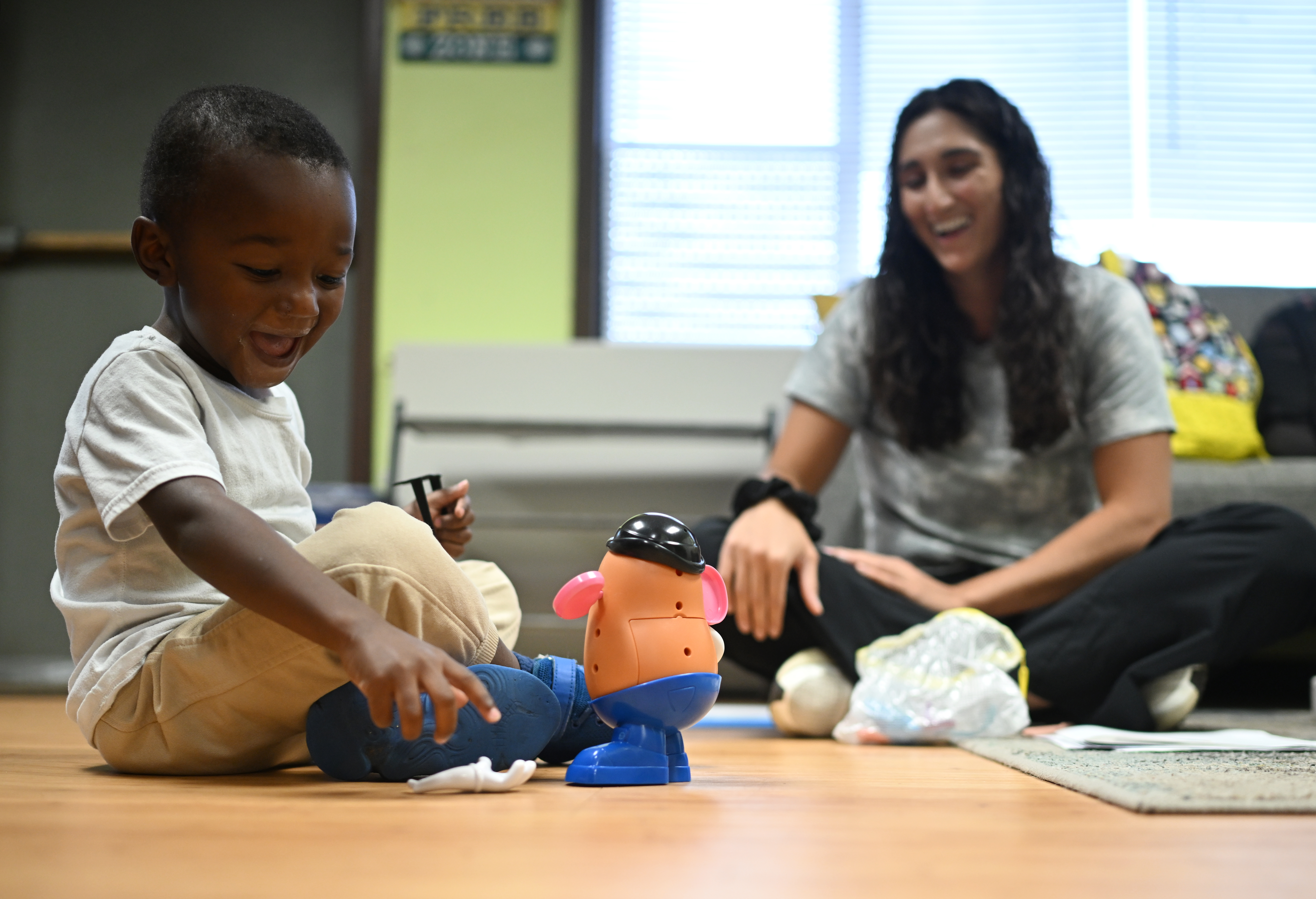 Three-year-old Kaycee Thomas laughs as he works with his speech therapist, Taylor LoMonaco, at Venture for Success Preparatory Learning Center on Thursday, Oct. 1, 2026, in Denver. (Photo by RJ Sangosti/The Denver Post)