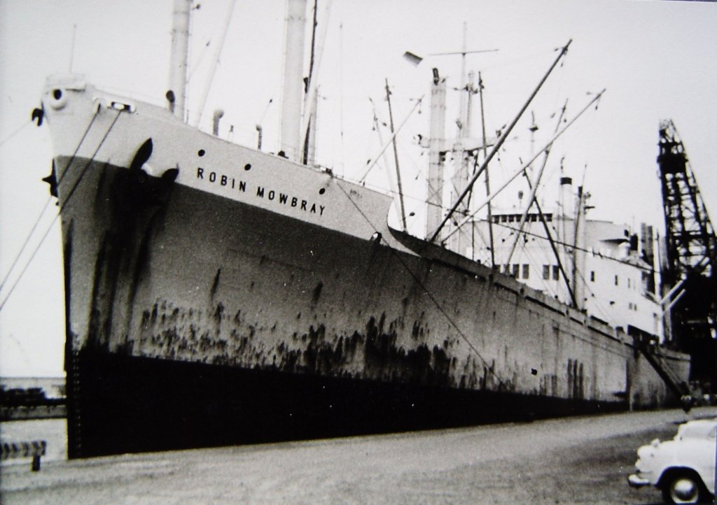 The US-flagged Robin Mowbray, ex-HMS Slinger, unloading cargo in the port of Bremerhaven, Germany, August 1966.