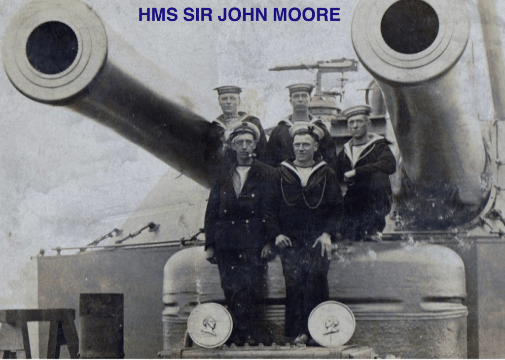 George Buttery on the right at the back (possibly left back). Between the main guns of HMS Sir John Moore with the kind permission of Craig Buttery
