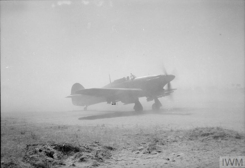 A rocket-carrying Hawker Hurricane Mark IV of 221 Group taxies to its take-off point at a forward airfield in Central Burma