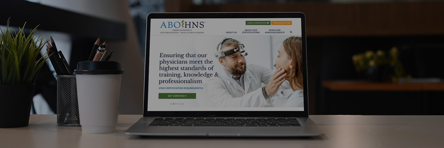 The American Board of Otolaryngology - Head and Neck Surgery website seen on a laptop screen