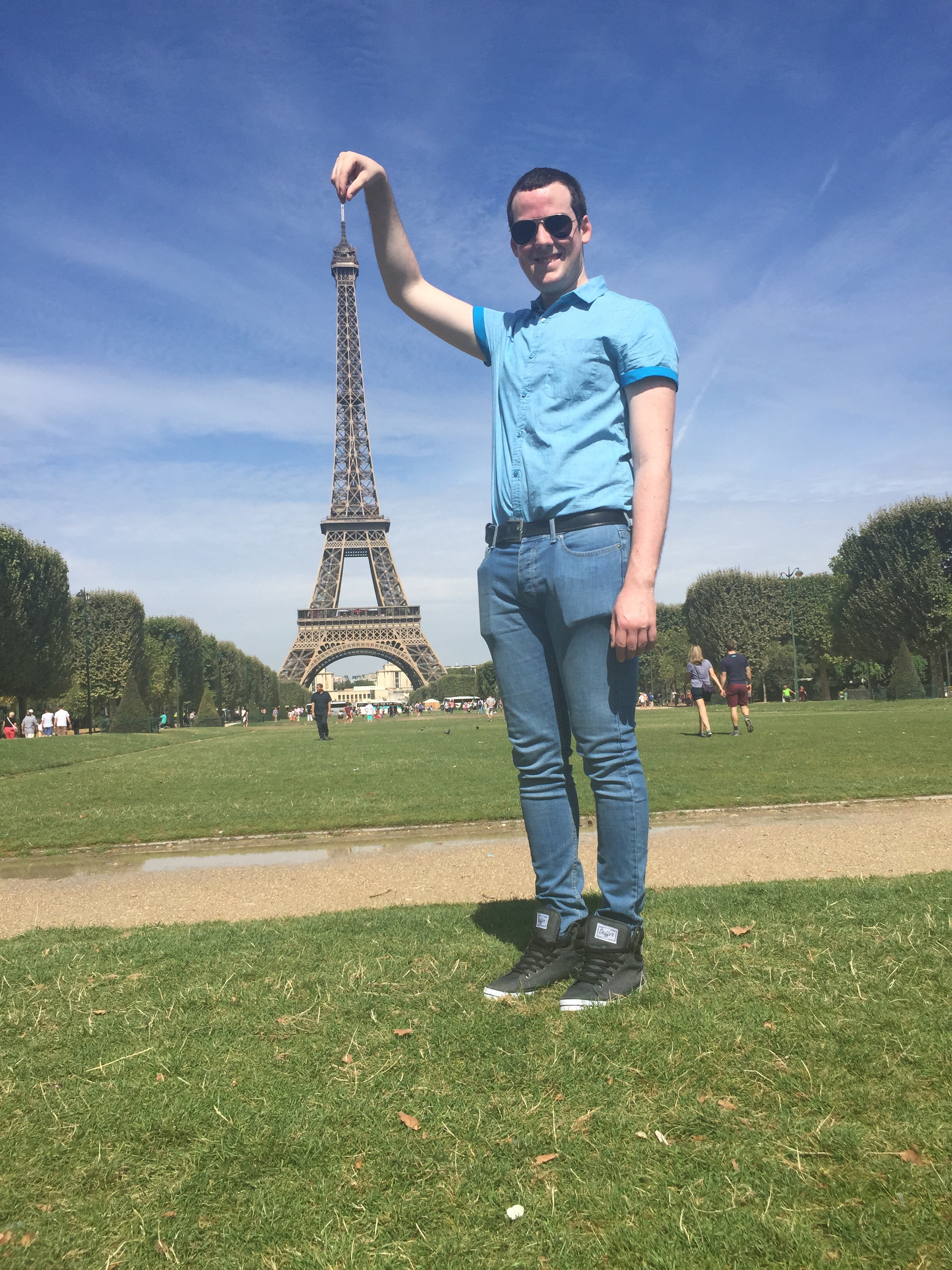 Posing with the Eiffel Tower