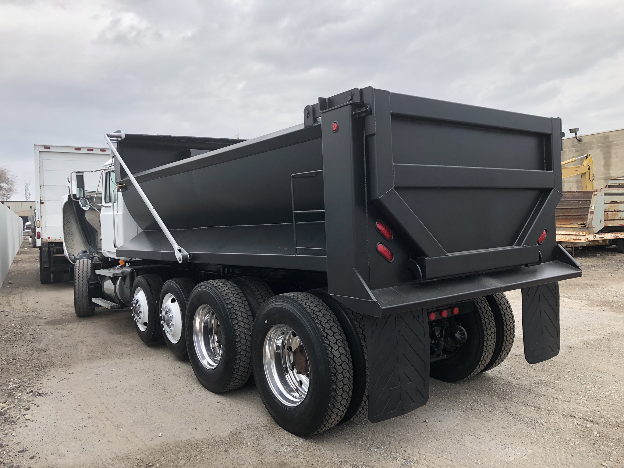 CH613 5 AXLE ROCK BED DUMP TRUCK Dogface Heavy Equipment Sales