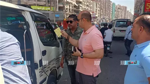 ضبط 401 مخالفة سرفيس وفض موقف عشوائي بميدان الجيزة وآخر بالمنيب