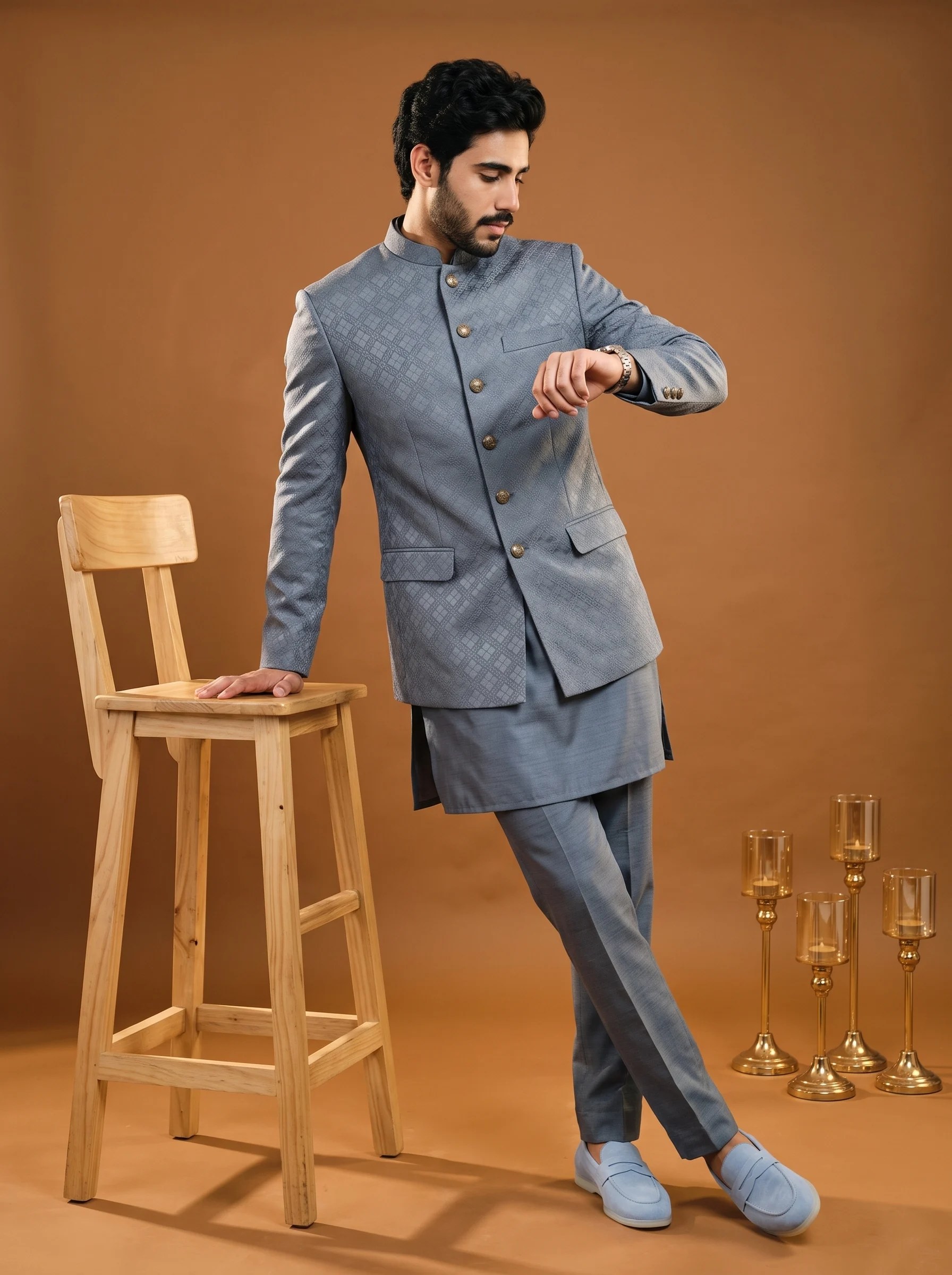 Men's steel grey jacquard prince coat with elegant metallic buttons and mandarin collar, paired with a matching silk kurta and trousers for weddings and formal occasions.