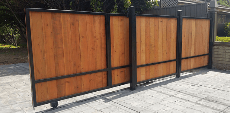 Up The Beauty Of Your Property With A Sliding Wood Gate
