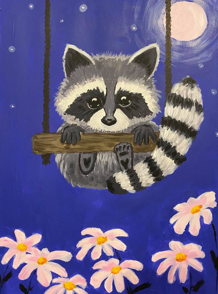 racoon on a swing