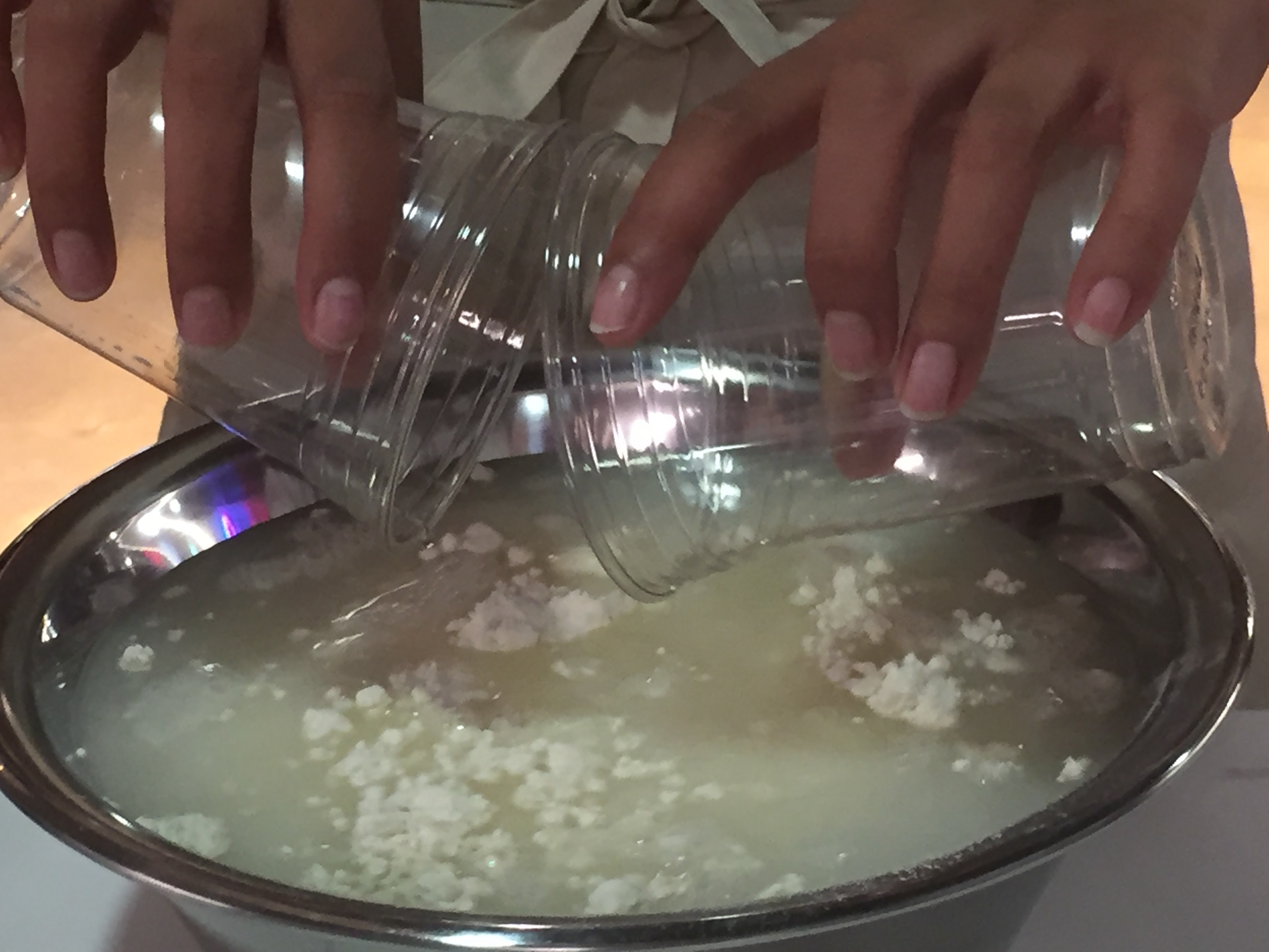 Adding water to bread dough