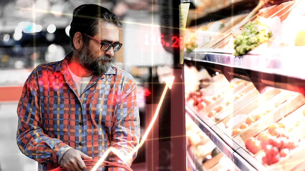 Photo of a man in grocery store looking to represent inflation in Canada