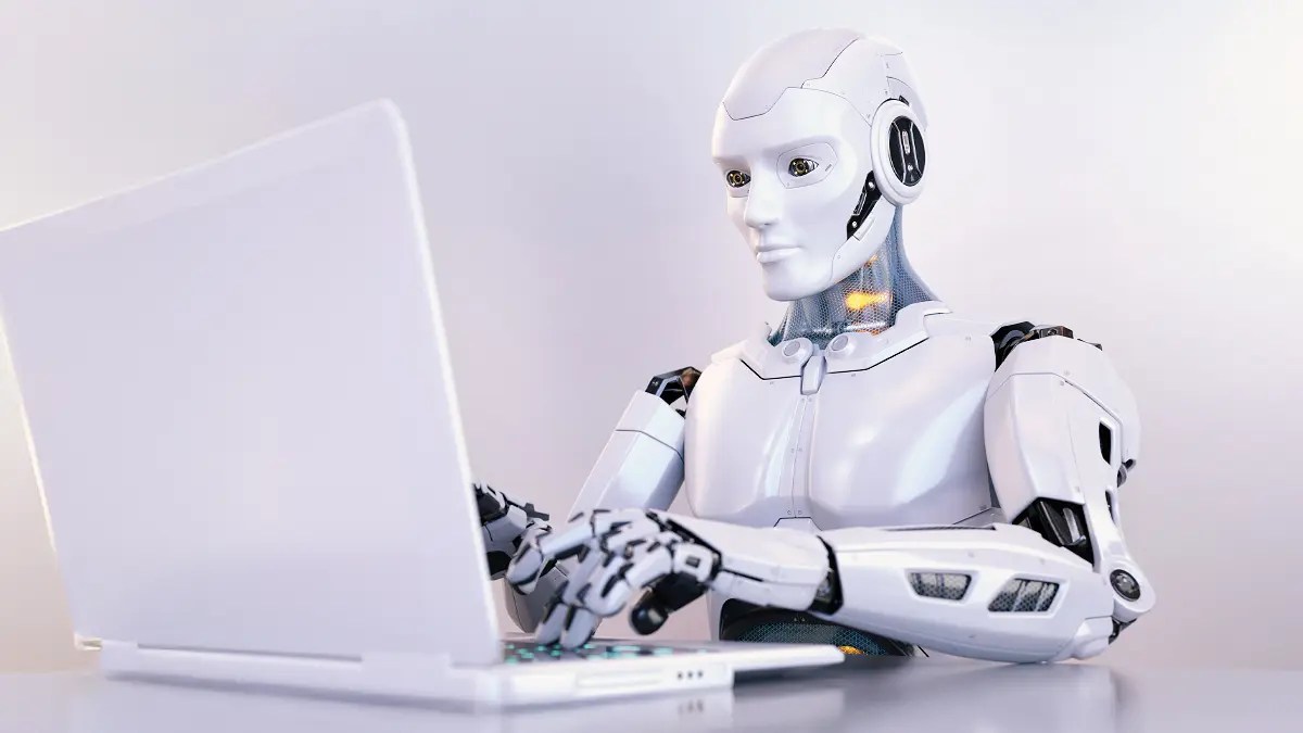 Robot working on a laptop