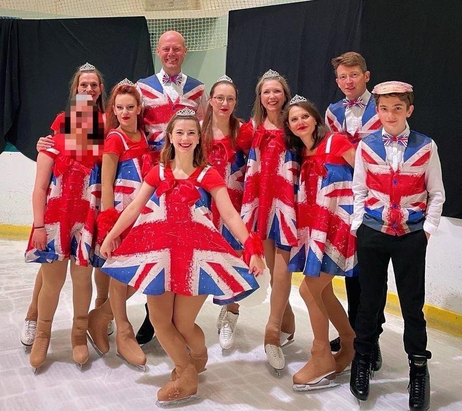 A group of young ice-skaters dressed in matching glittery union jack outfits