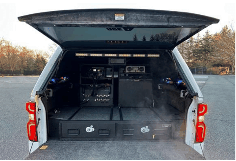 2024 Jacobs Proposal Response An image of the Jacobs CSS system as integrated into a Chevrolet Silverado for the Virginia State Police.