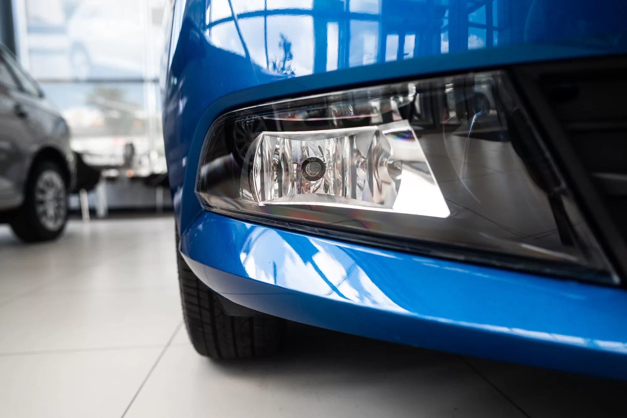 Registering a New Motor Vehicle: Car fog light of new white car close up | Vehicle Registration at NaTIS | Register your vehicle at NaTIS