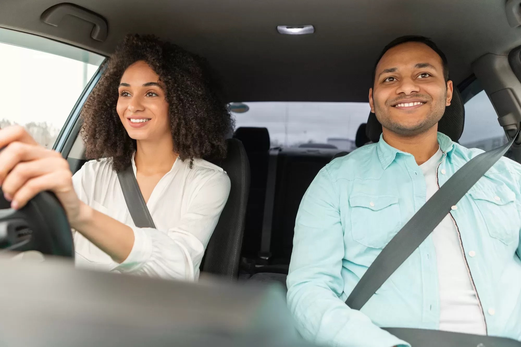 Happy Driving Instructor Teaching Driver Lady To Drive Car | Pass Your Natis Driving Test on the First Try with These Expert Tips!