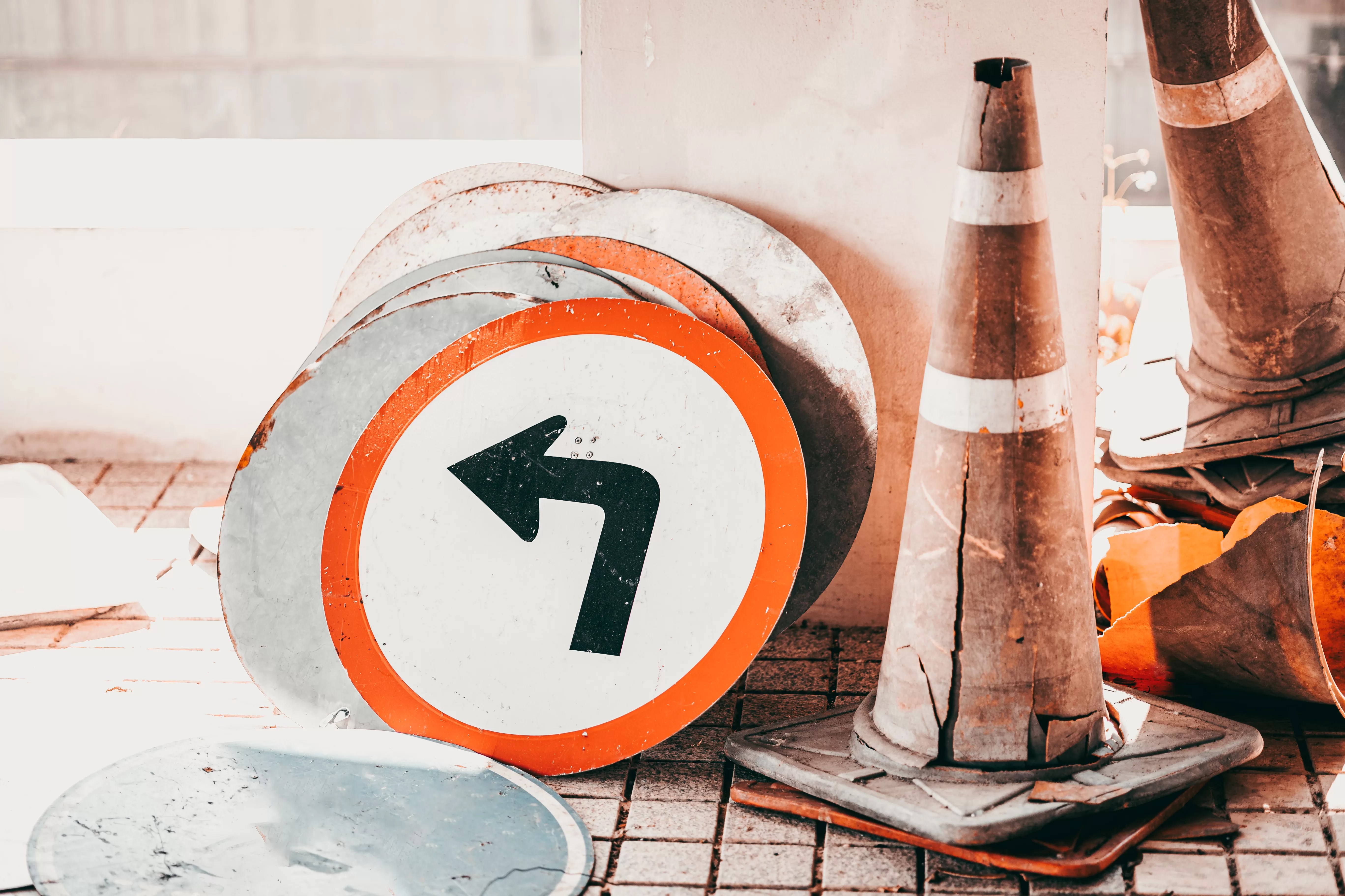 Old unused dirty broken road traffic sign banner and traffic cone waste grunge. Frequently Asked Questions (FAQs): Premium NaTIS Question Papers with Solutions