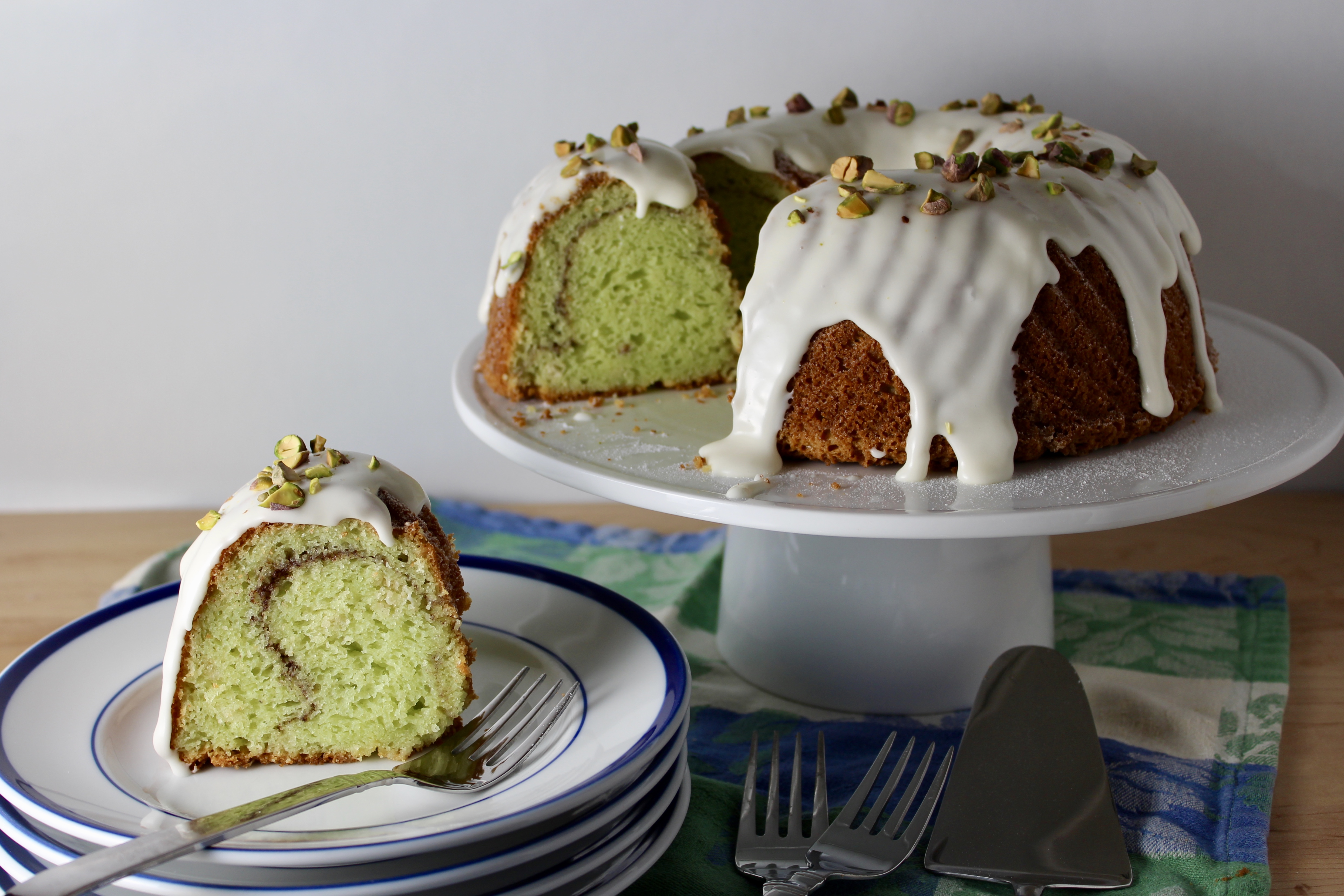 Beat in eggs, 1 at a time (reserve 1 tbsp of the egg white for glazing). Pistachio Bundt Cake with Cream Cheese Glaze | epicuricloud (Tina Verrelli)