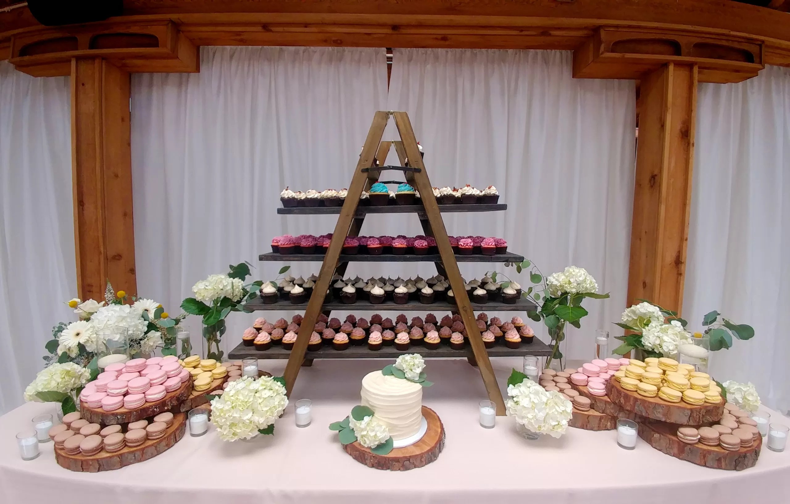Bella Bella Bakery cupcake display and small wedding cake