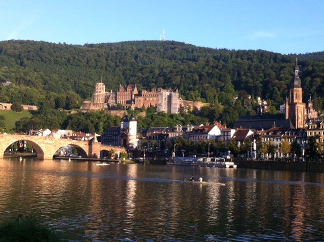 The Heidelberg Castle is nestled among the forests and hills, and overlooks the River Neckar flowing across the city.