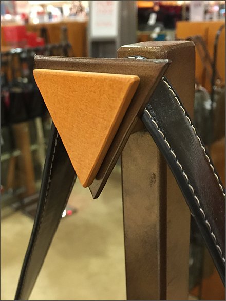 Triangular Finial as Wood-tone Directional