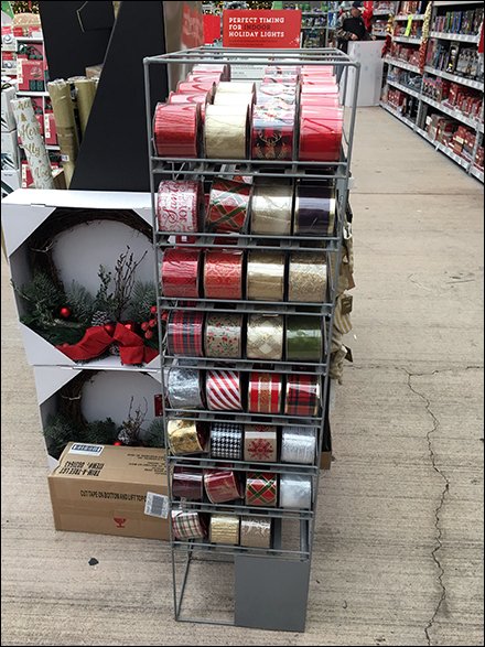 Gravity-Feed Floor Rack for Ribbon Spools