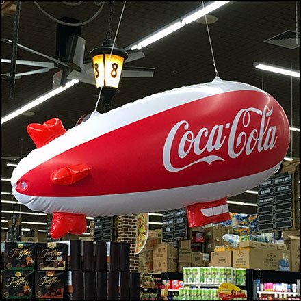 Coca-Cola Blimp Cruises Cashwraps At Food Bazaar