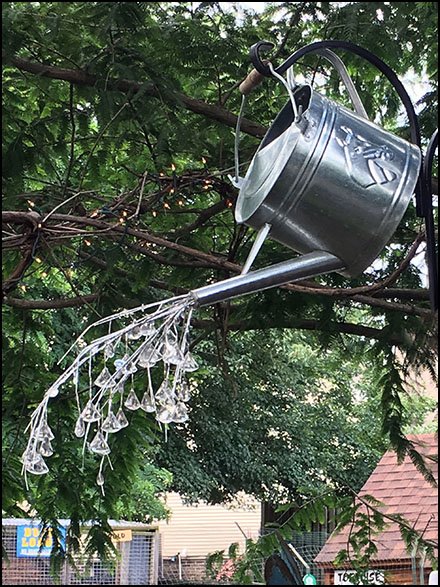 Sprinkling Can Hero Overhead Prop