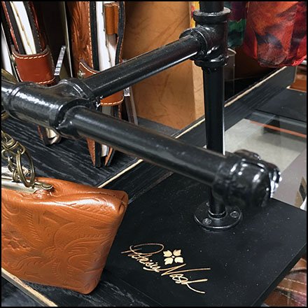 Patricia Nash Pipe Rack Purse Display