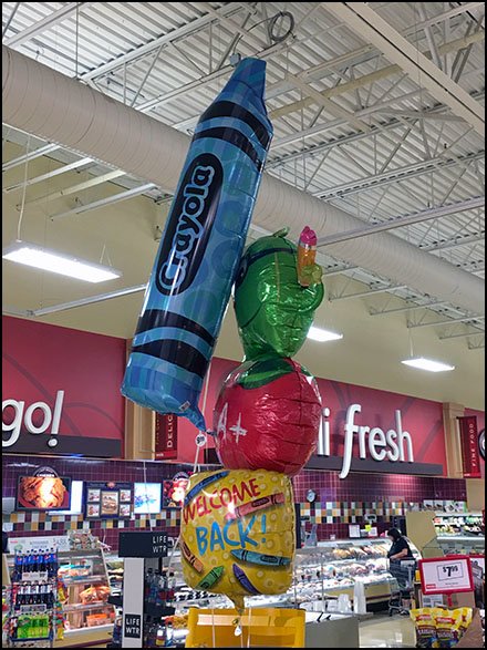 Crayola Inflatable Points To Center Store