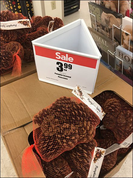 Triangular Sign For Pine Cone Merchandising