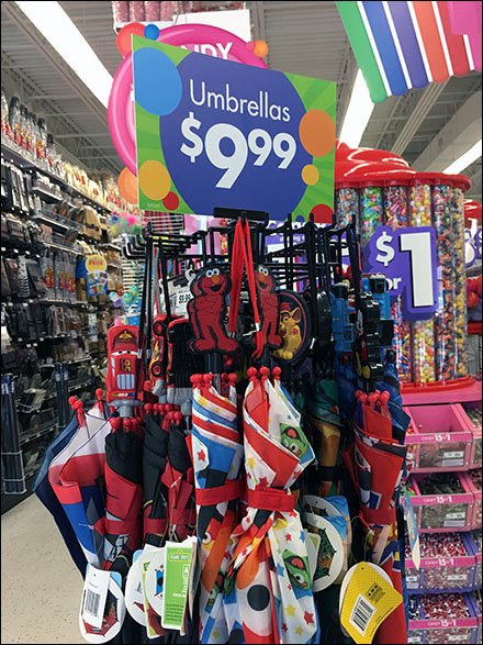 Elmo Umbrella Tree Sign As Merchandising Focus