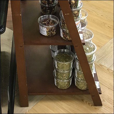 Triangular Wood Rack Leans At Aisle End