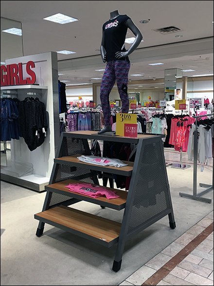 Trapezoid Rack Staggers Apparel Offering