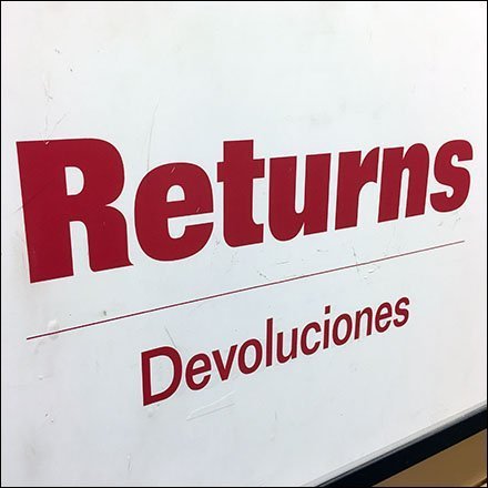 Returns Processed Here Designator Sign