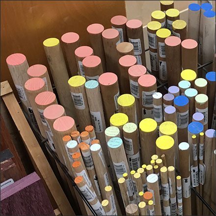 Color-Coded Dowels In a Wire Rack Feature