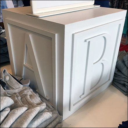 Polo Alphabet-Block Visual Merchandising Feature