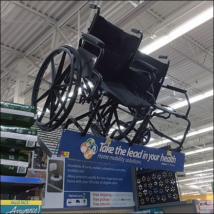 Overhead Wheelchair Merchandising Heroes