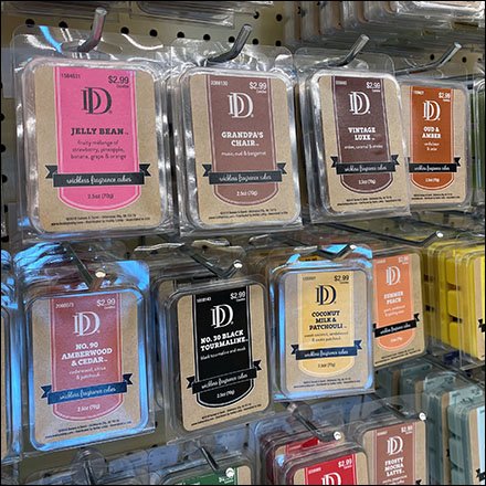 Candle Aisle Endcap Endlessly Hooked Array Supports 90 Facings