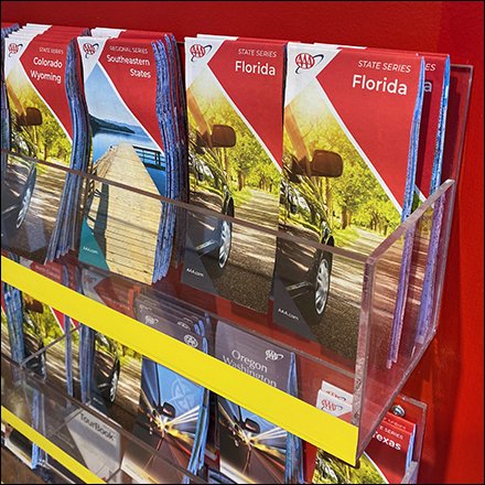 AAA Maps & Tourbook Encyclopedia Fills A Wall Rack