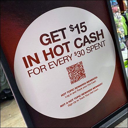 Hot Topic Get Hot Cash Sock Merchandising Median Signs