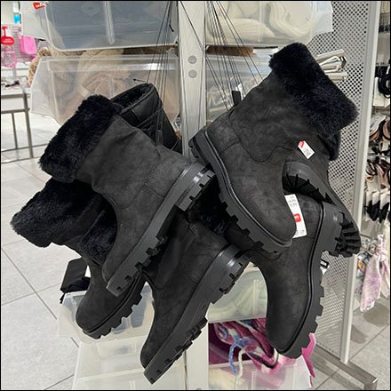 Intricate Strung-Up Boot Display Strategy Is Unique