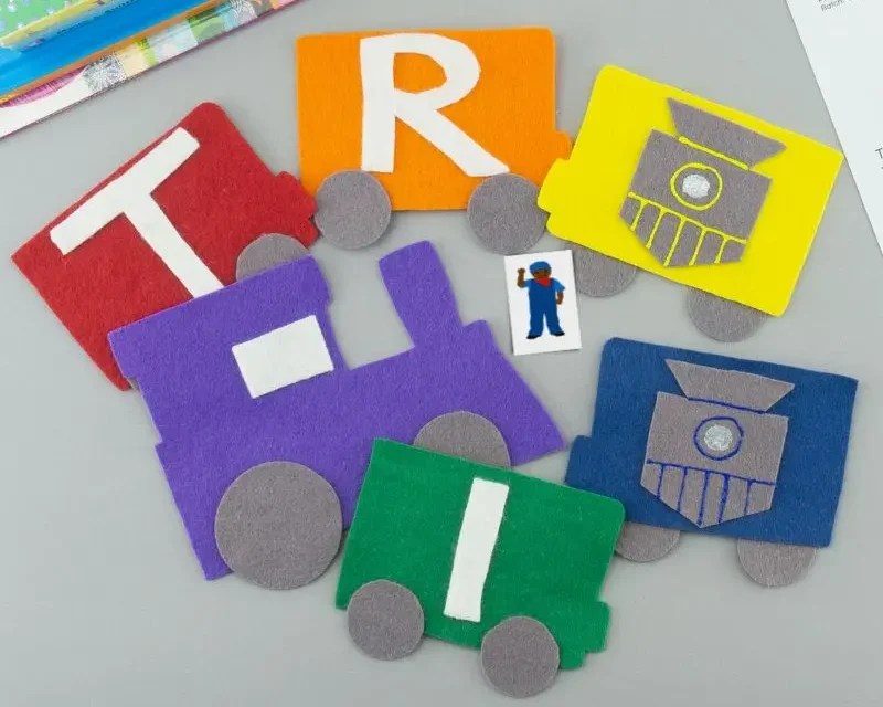 Train felt board set with books peeking at corner